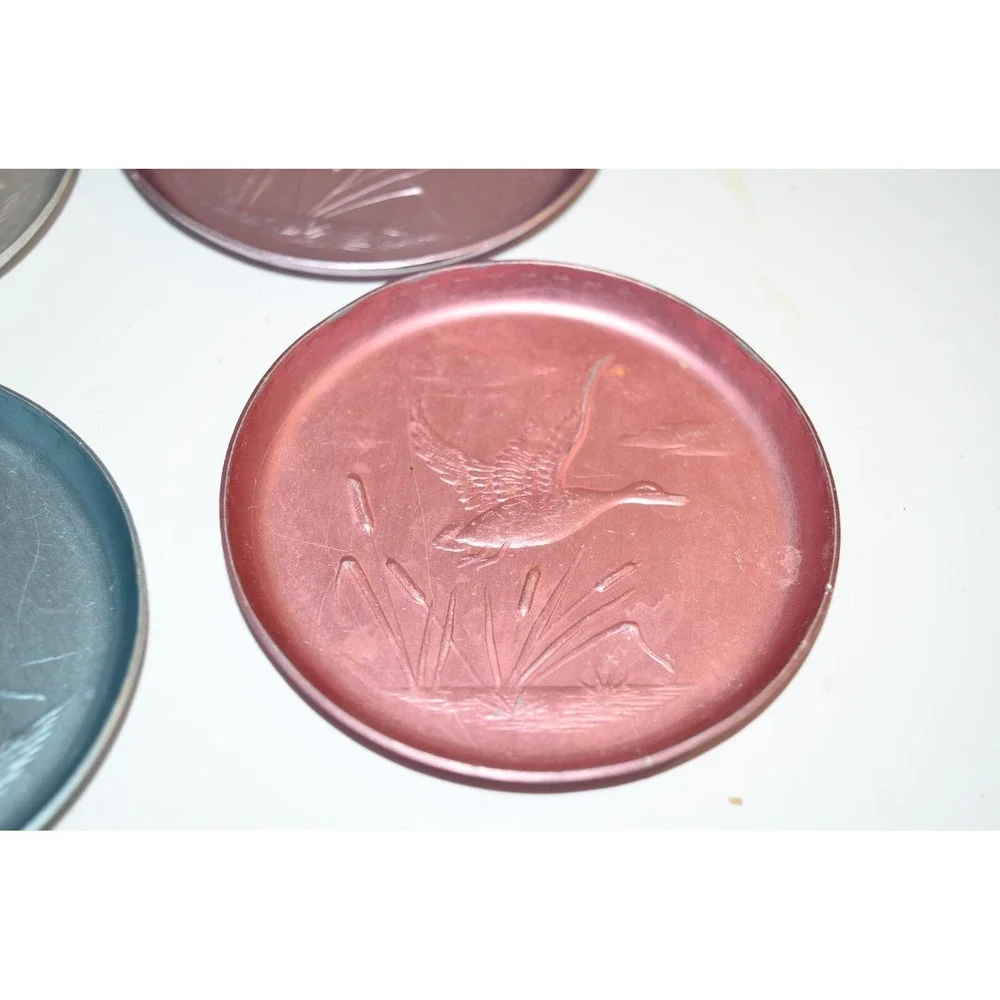 Vtg 6 pc set Ducks Flying‎ Over Cattails Embossed Aluminum Coasters